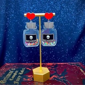 Poison pills skull earrings